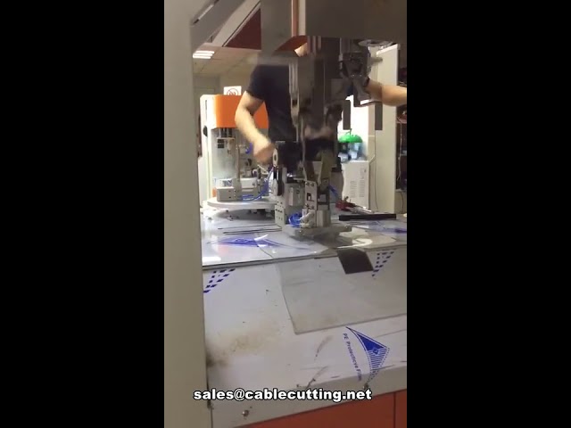 Macchina automatica per avvolgimento e fascettatura cavi elettrici di potenza