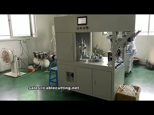 Macchina automatica per taglio, avvolgimento e legatura di cavi e fili con fascetta metallica
